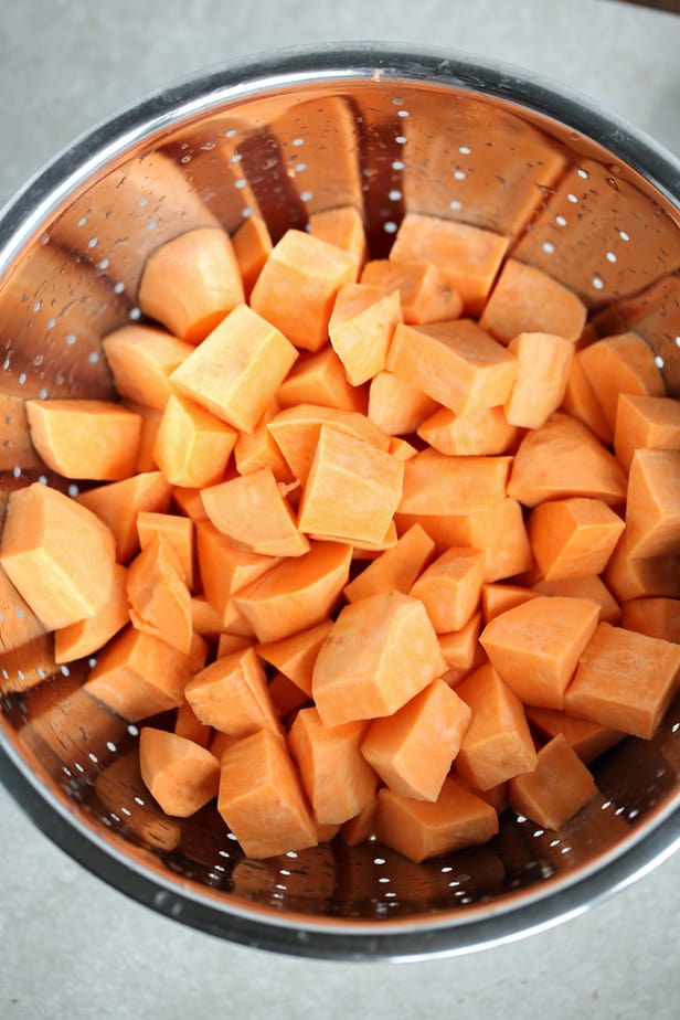 Sweet Potato Bake, Sweet Potatoes cut up in a colander