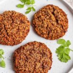 3 Veggie Burgers on a white plate