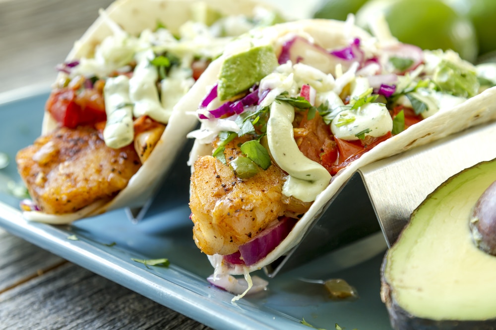 Fresh fish tacos with coleslaw and avocado